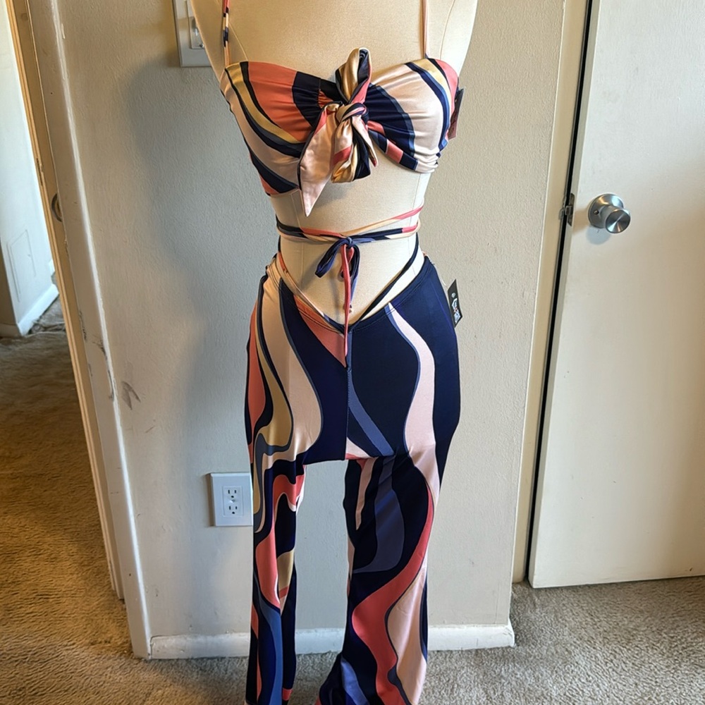 Two piece set. Still with tags. Size small